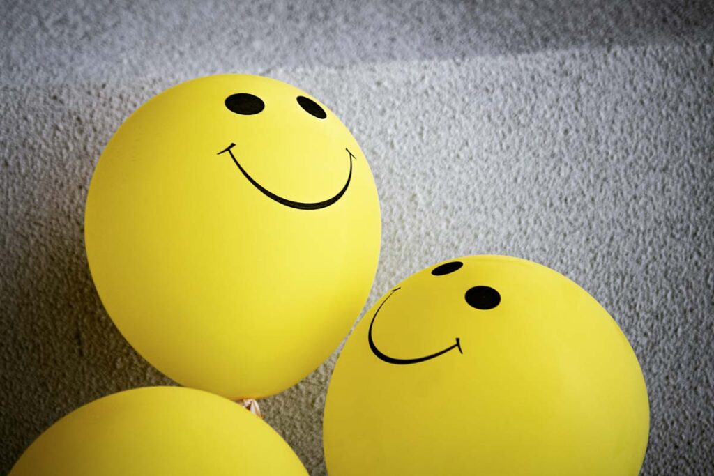 balloons with smiley faces