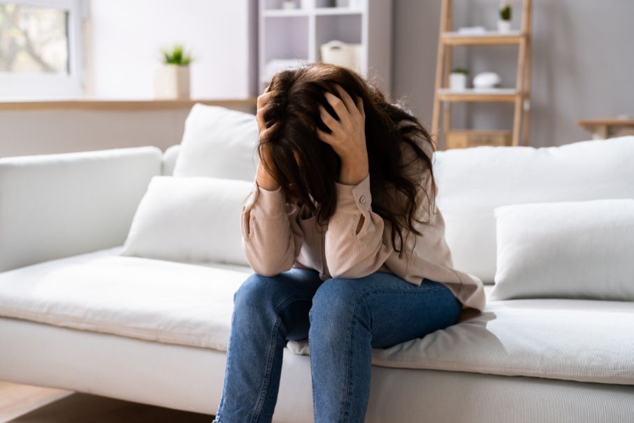 Woman struggling with OCD sitting on therapist chair at Valor Behavioral Health in atlanta GA 