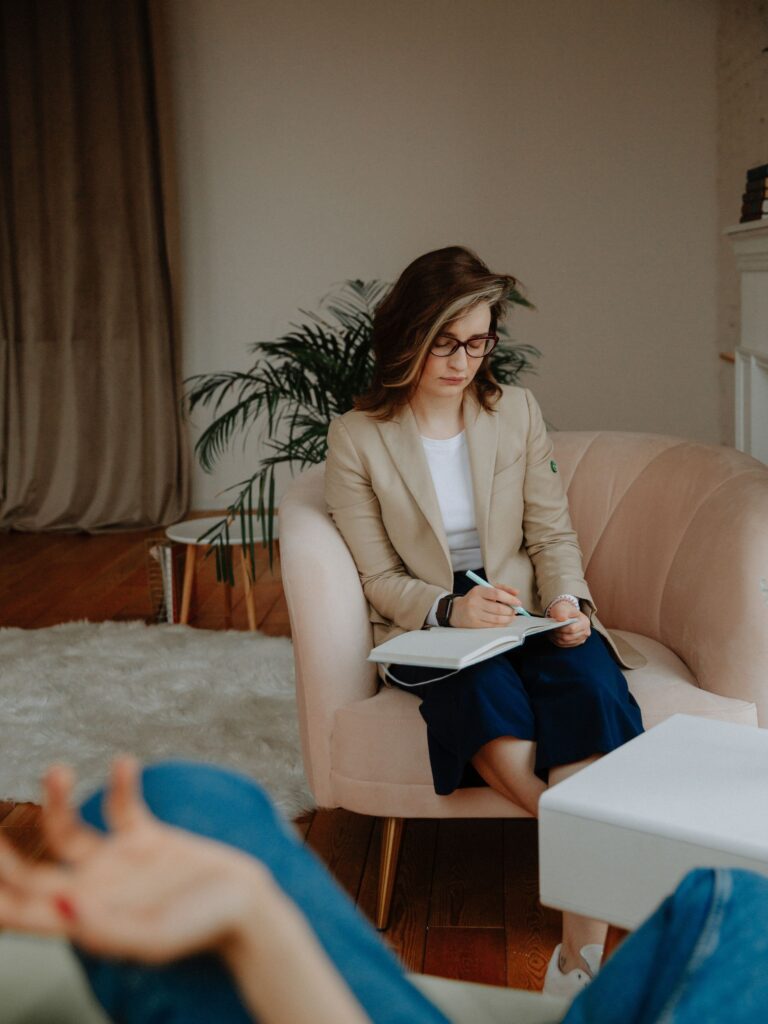 woman speaking with her therapist regarding medication for mental illness pros and cons