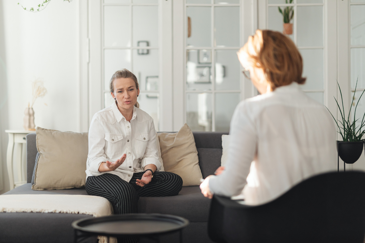 woman speaking with her doctor regarding Does UMR Cover Mental Health?