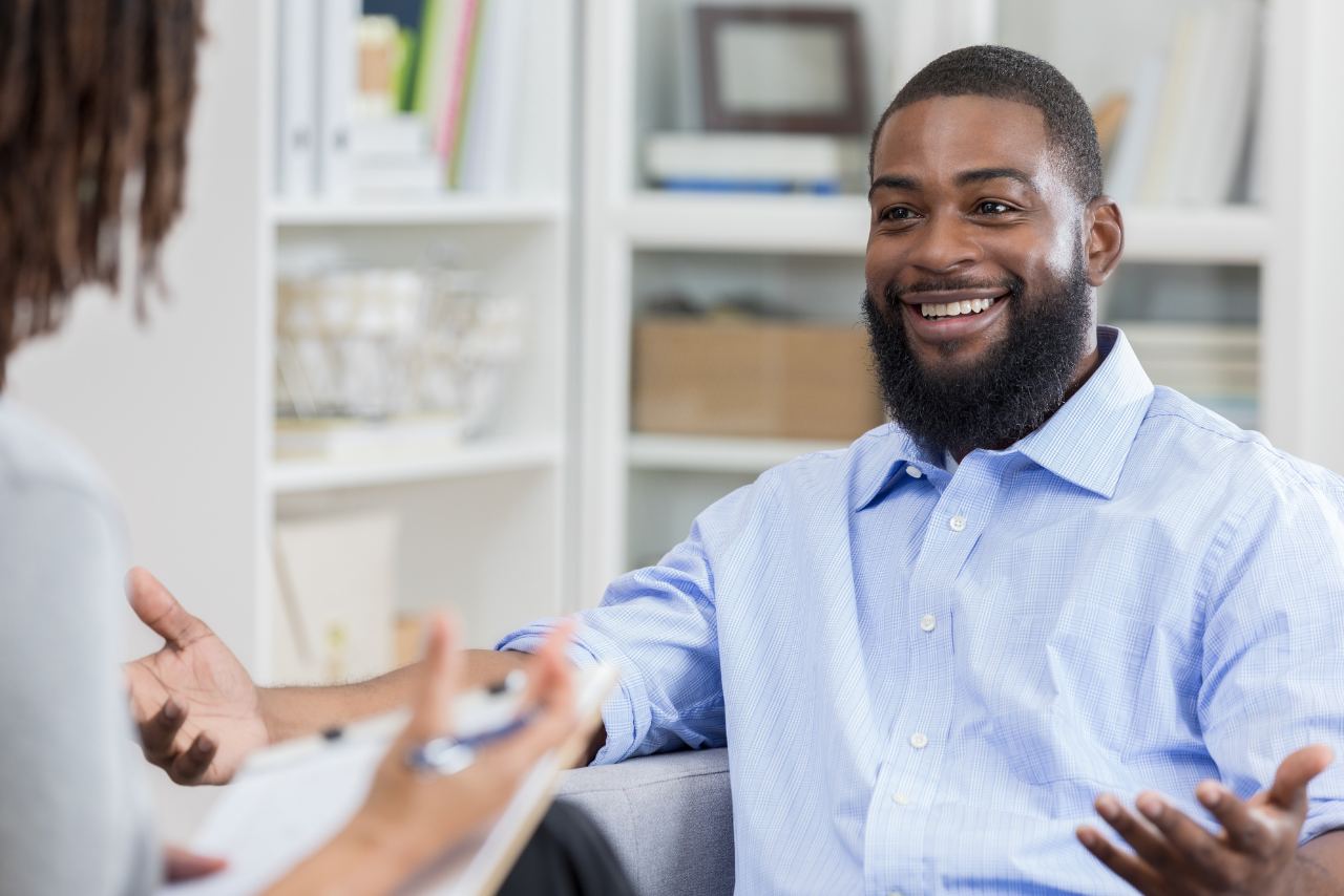 Man speaking with his doctor regarding Does UMR Cover Mental Health?